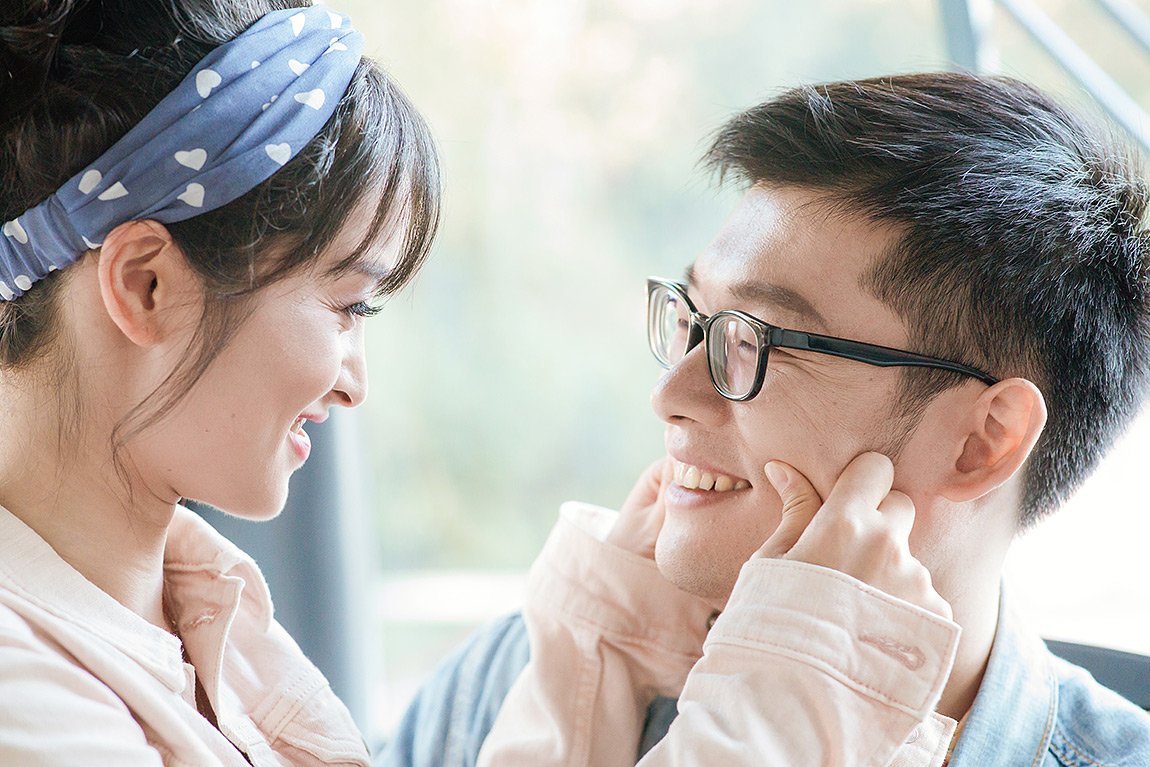 Smiling Asian couple